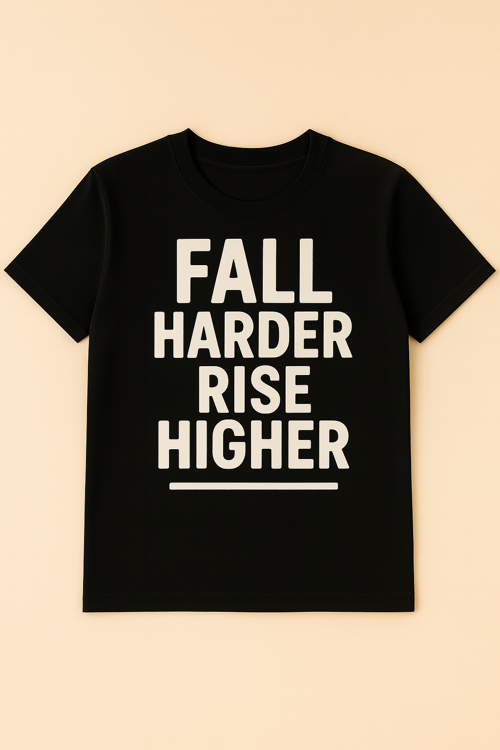 Black t-shirt with 'Fall Harder Rise Higher' text on a beige background