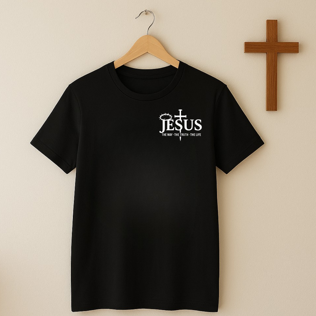 Black Christian Jesus T-shirt hanging on wall with wooden cross