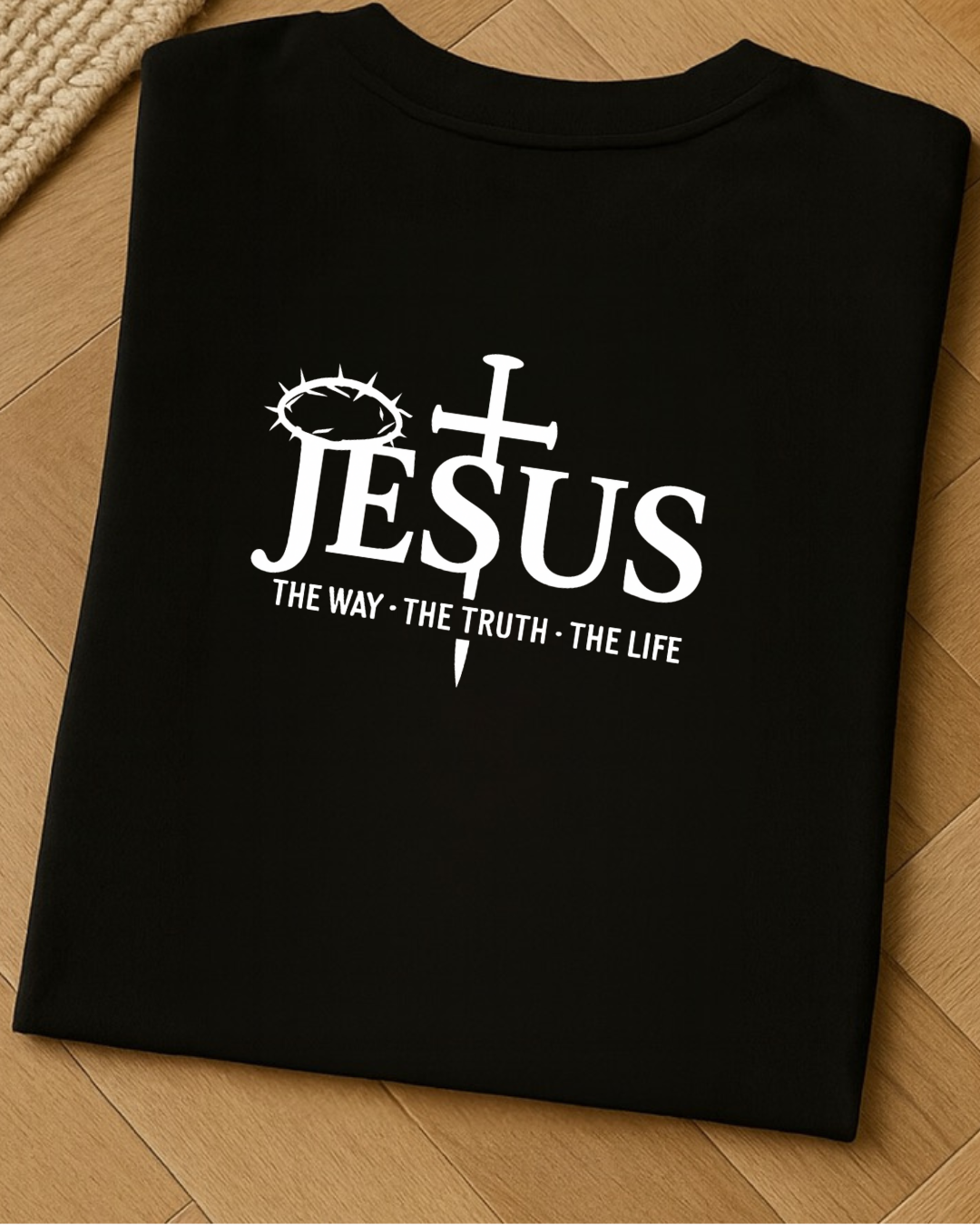 Folded black Christian T-shirt showing Jesus The Way The Truth The Life back design