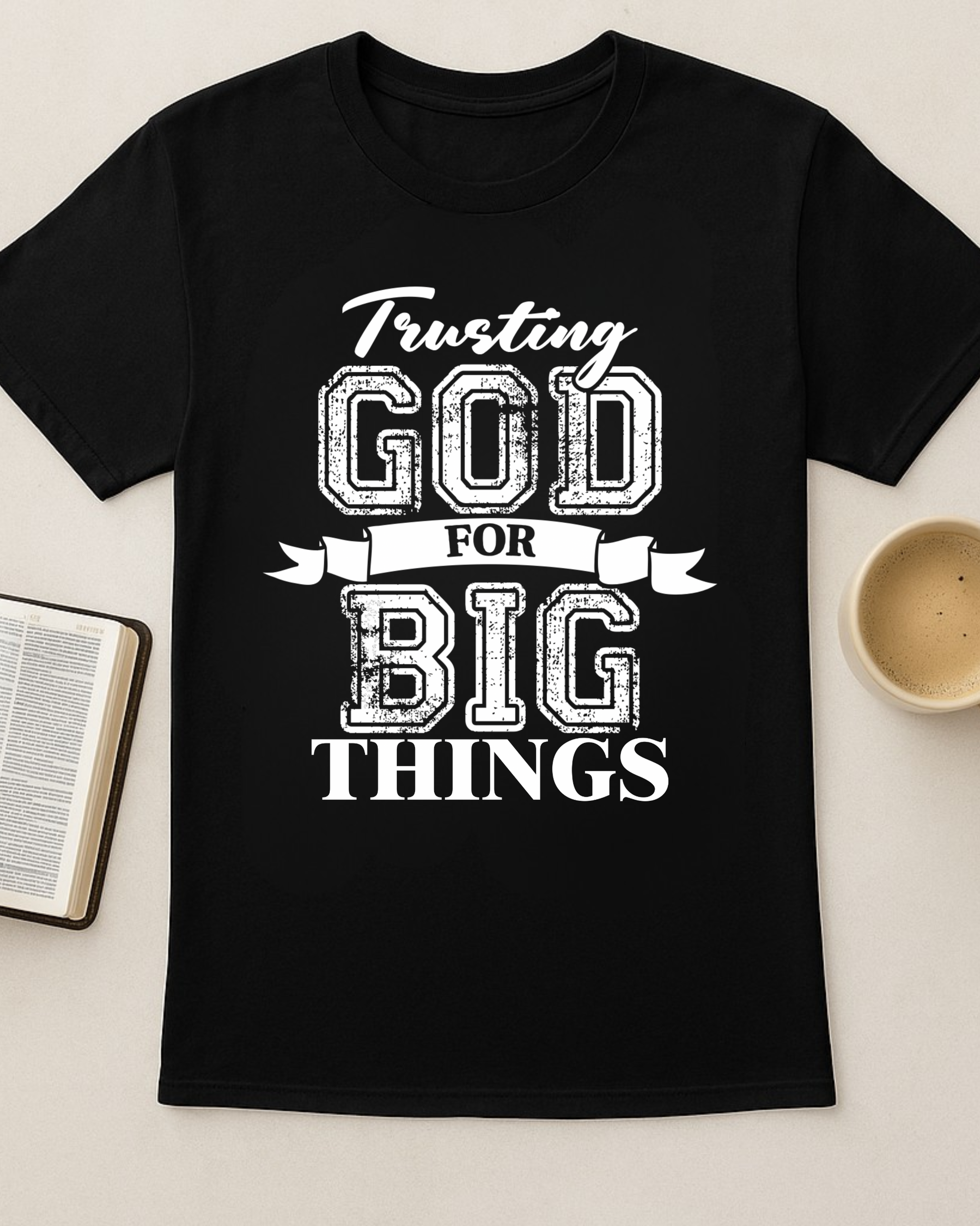 Black Christian shirt flat lay with Bible and coffee reading trusting God for big things faith design